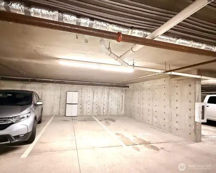 Take the elevator down to the two secured parking spaces.