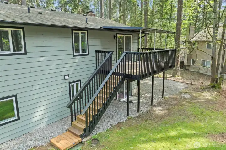 Covered back deck extends outside even in the rain~