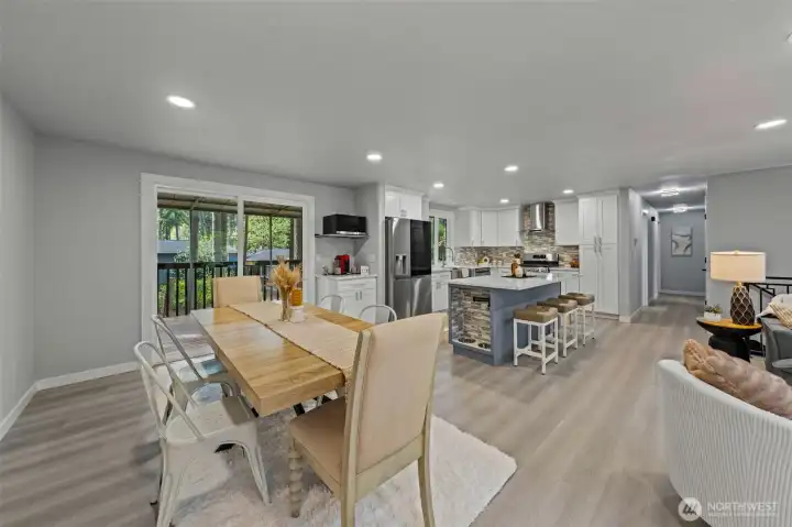 Lovely view of the dining area and that glorious kitchen!!!  LOVE the doggie water and food station!