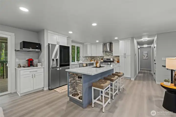 Look at this kitchen with white and grey shaker cabinets, dog food station and espresso station! This is a show stopper!!!