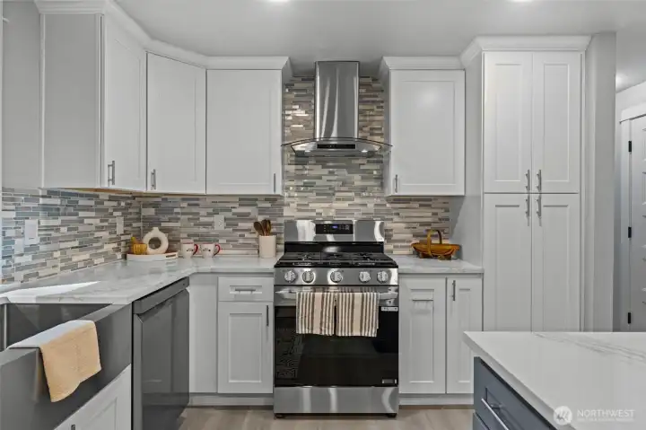 White shaker cabinets and quartz counters~
