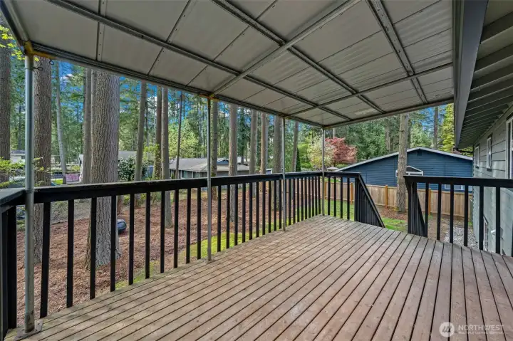 Nice covered back deck extends your living outside even during the  winter rains~