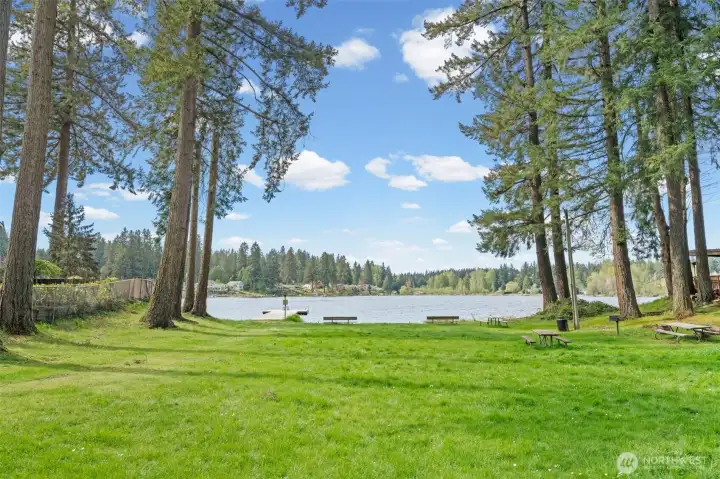 Expansive park-approx 1 acre boasts cabana clubhouse, firepit and play toys