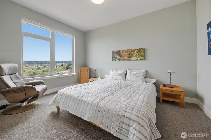 Oversized primary bedroom with walk-in closets and en-suite bathroom Oversized primary bedroom with walk-in closets and en-suite bathroom