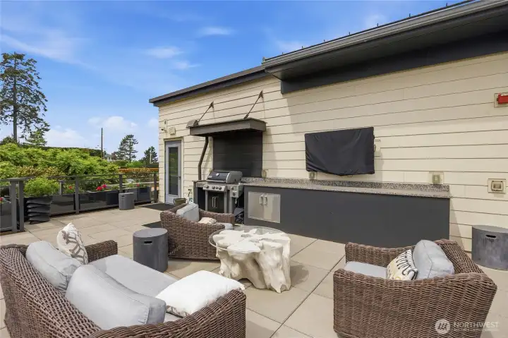 Rooftop terrace with tons of seating, grills, and outdoor TVs. Rooftop terrace with tons of seating, grills, and outdoor TVs.