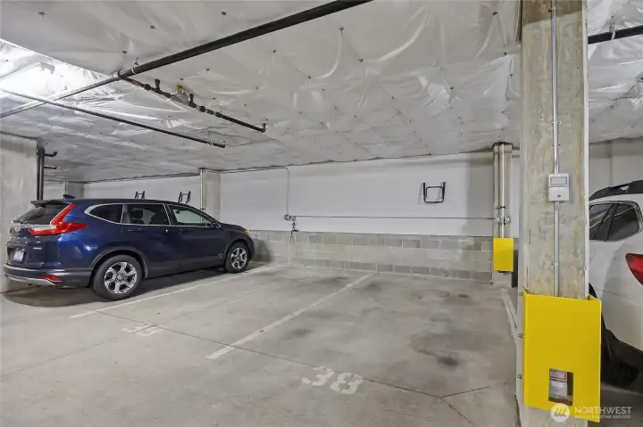 Two parking spots are included. One in the secure parking garage and the other outside in a reserved spot. Two parking spots are included. One in the secure parking garage and the other outside in a reserved spot.