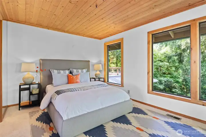 Primary bedroom with views. Primary bedroom with views.
