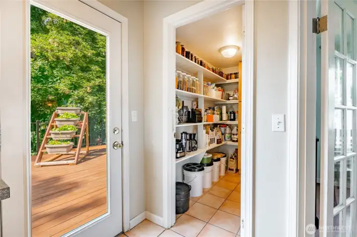 Very large walk-in pantry - back deck access