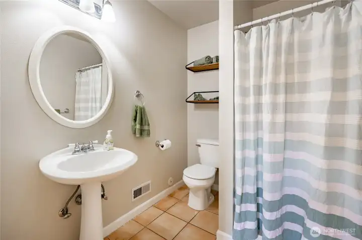 3/4 bathroom by laundry closet area