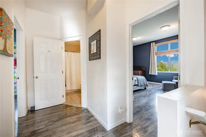 Upstairs you find all 3 bedrooms and full bathroom - notice zero carpet throughout entire home!