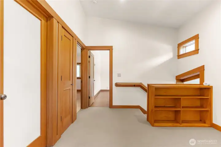 Built ins help organize upper landing. Built ins help organize upper landing.