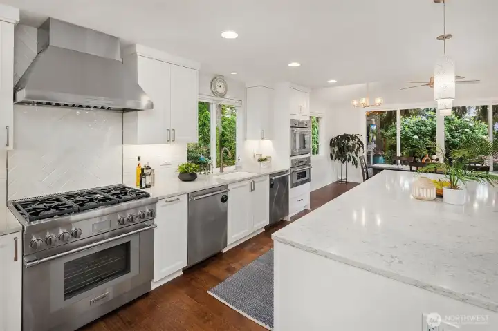 This Kitchen Features a Thermador appliance package with Refrigerator/Freezer combo (to the left of the Stove)  6 burner stove top and large oven below & high capacity Hood Range above.  2 dishwashers flank the sink for easy loading.  To the far right is the Steam Oven (top) that also can be a traditional oven, and the Microwave/Convection oven featured below.