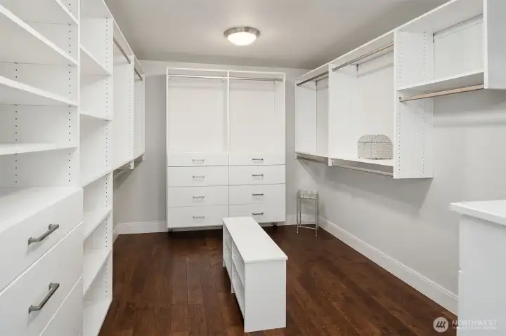The primary Walk-in Closet hasa a custom Built-in cCloset system with Self closing drawers.