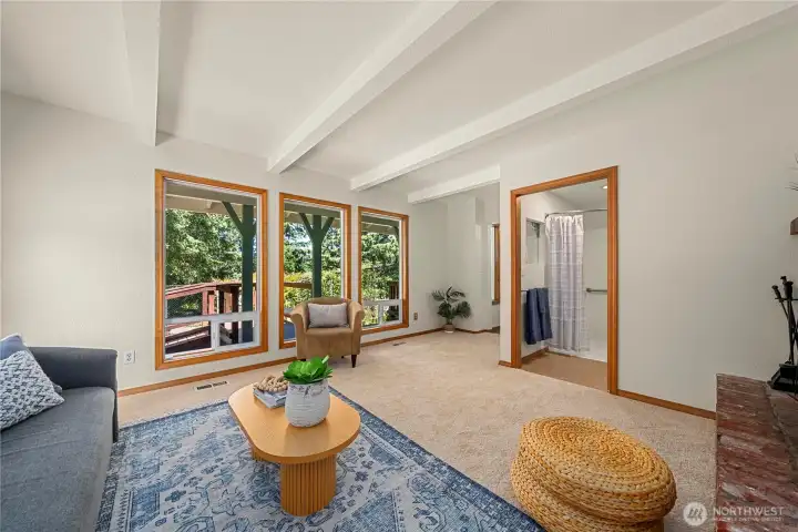 Large windows bring in natural light and views.