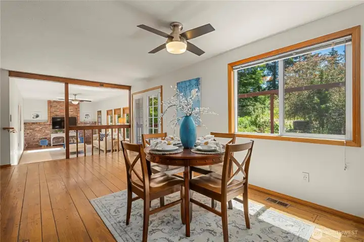 Kitchen flows seamlessly into dining and family areas.
