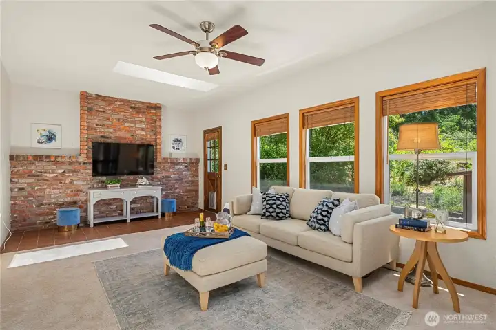Family room offers flexibility for relaxing or hosting.