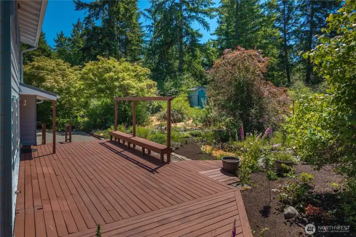 Spacious wrap-around deck perfect for outdoor living.