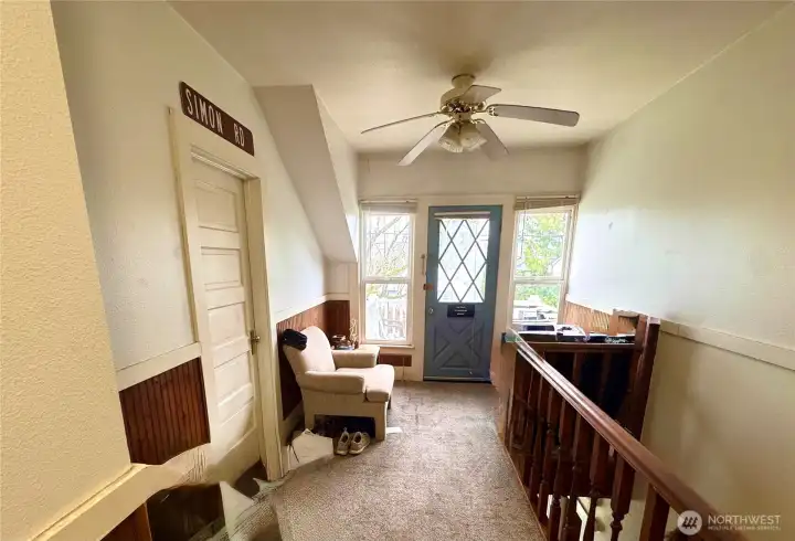 Upper level landing and door to upper deck