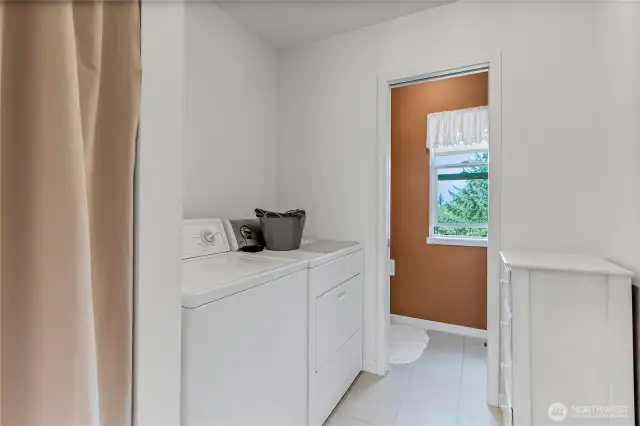 Laundry room just inside from garage entrance