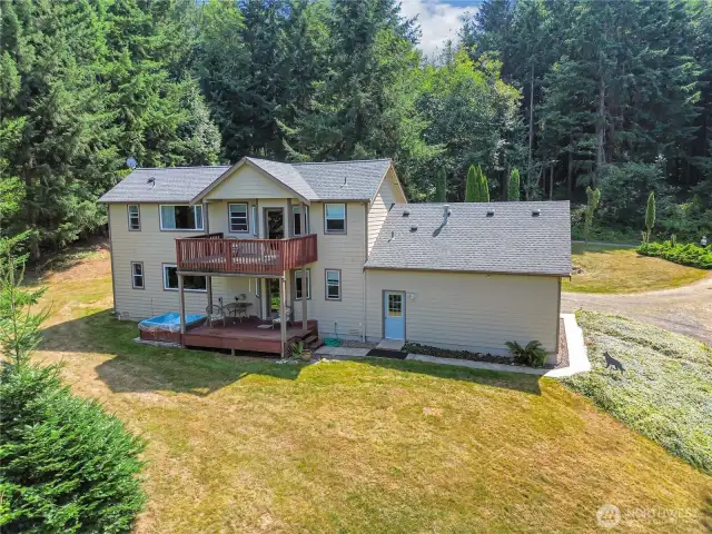 Home surrounded by forest of nearly 20 acres