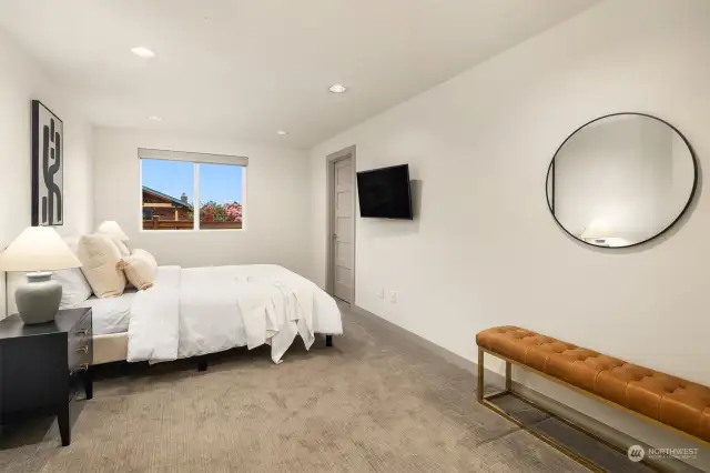 Ground level bedroom with spacious walk-in closet.