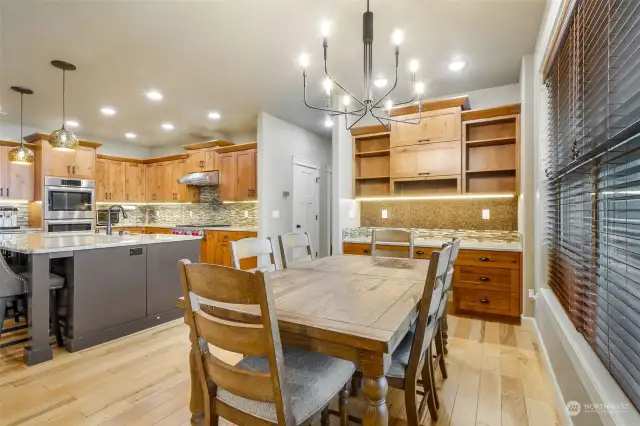 Large, open dining area with built in cabinetry.