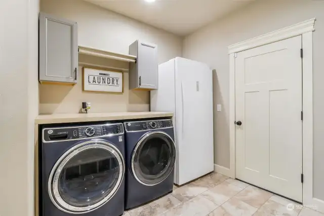 Room for a freezer in the laundry room.