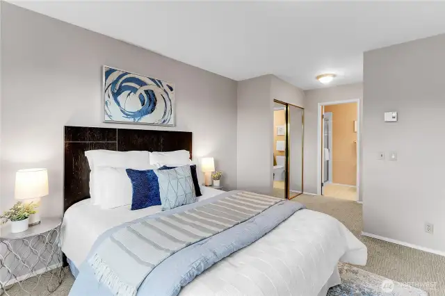 another view of the primary suite with ensuite bath