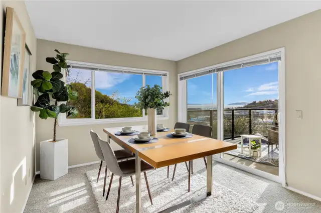 The dining area flows right outside to the deck, making this an idea space to entertain and enjoy the views!