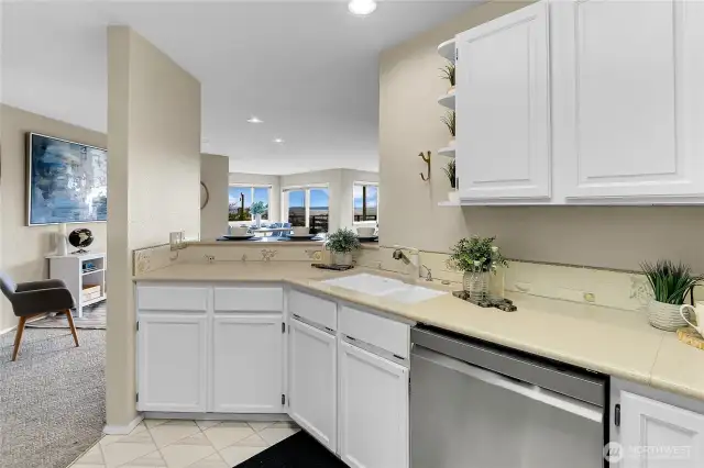 the kitchen opens out to the breakfast bar area making cooking and entertaining a breeze
