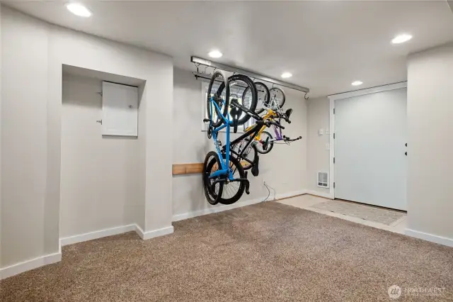 Finished room that opens to driveway. Built in organizers and bike racks make this a perfect drop zone.