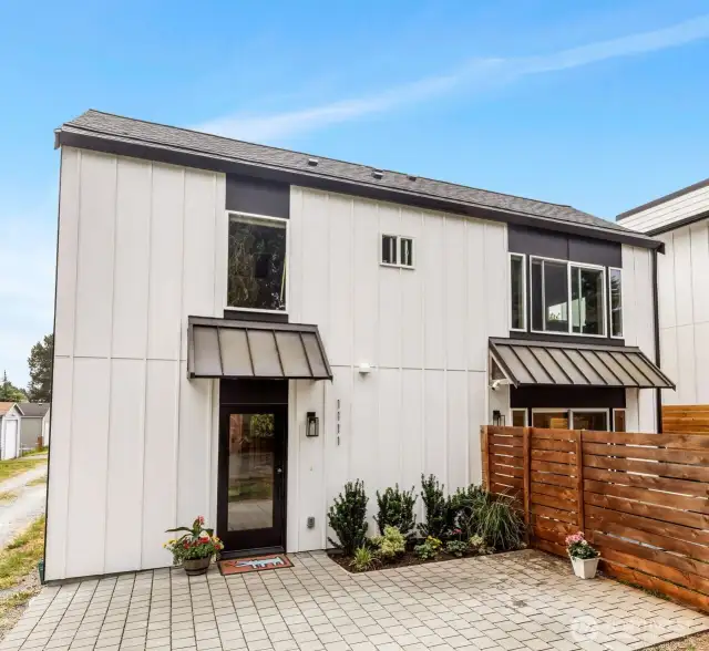 This home is lovely! There are no common walls to be concerned about, it has off-street parking plus a private fenced backyard.
