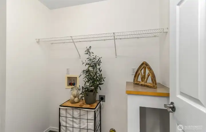 Laundry area with storage