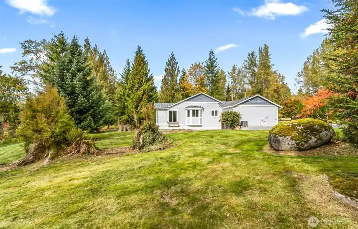 View from the side of the home, established landscaping