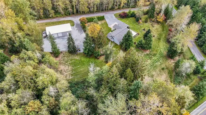 All the space, trees, yard, pond. This home has it all
