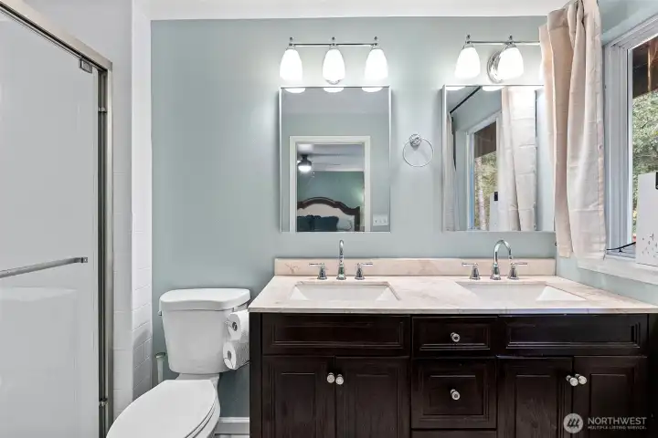 Primary bath was remodeled to expand the shower space - what a smart addition!