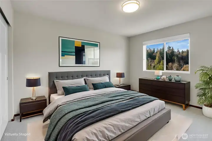 This is the 2nd bedroom on the main floor. Virtually staged.