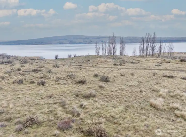 Ground-level photo from the parcel facing the lake.