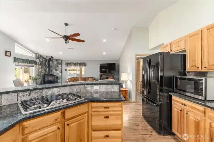 Kitchen looking towards eating bar and living room.