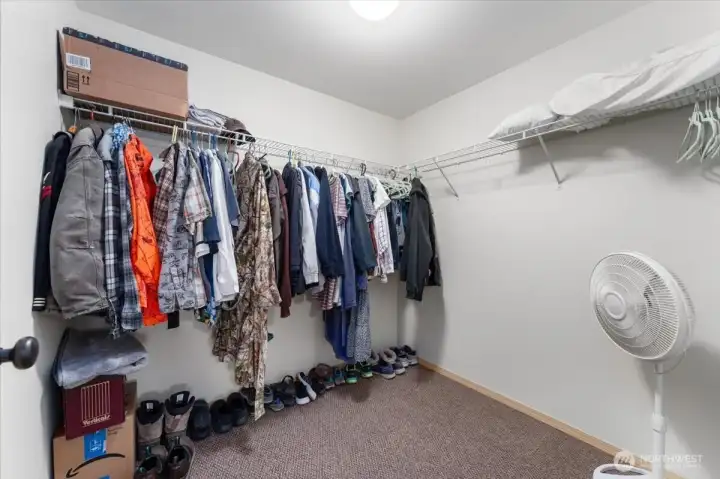 Primary bedroom walk-in closet.