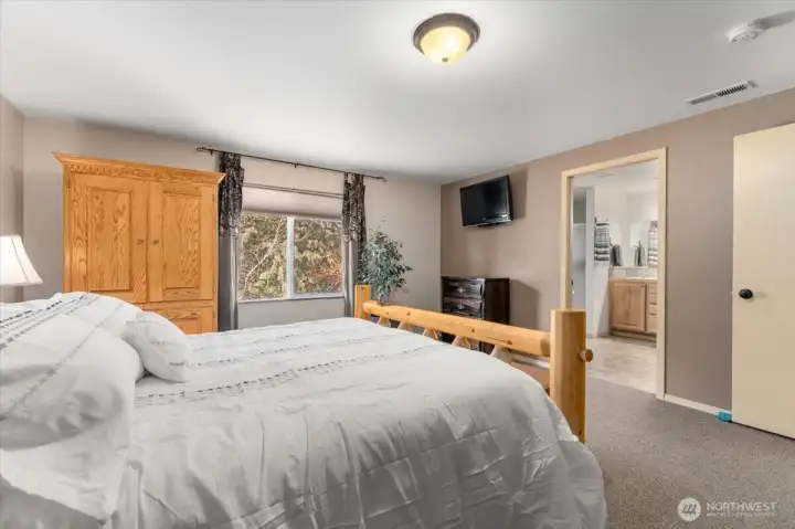 Primary bedroom looking towards primary bathroom.