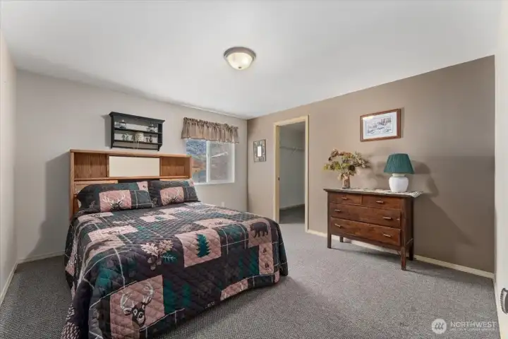 Bedroom #2, looking towards walk-in closet.