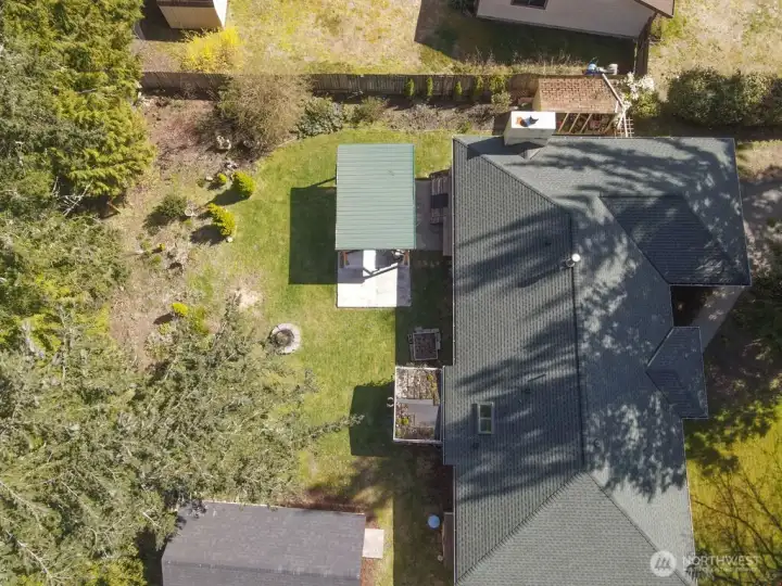 This lovely home backs up to a greenbelt full of majestic evergreen trees