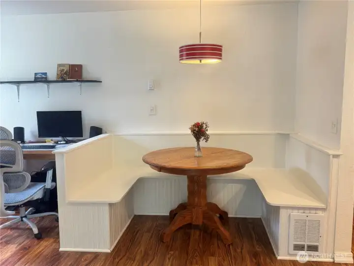 The dining area in the family room is right next to the kitchen for convenience.