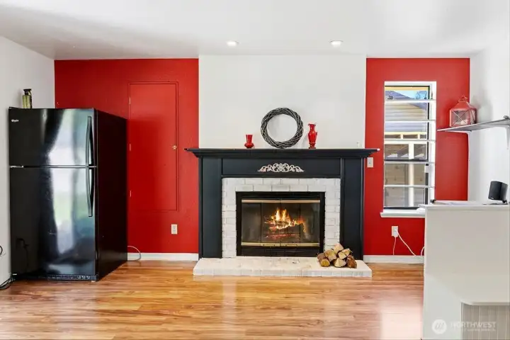 Great room off kitchen with a cozy wood burning fireplace