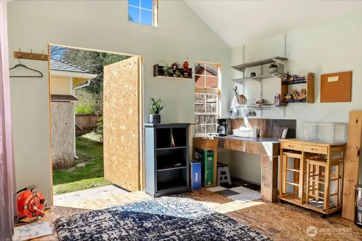 Two room shed has two doors. Great access and tons of light