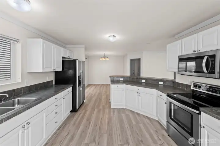 Kitchen flowing into the formal dining room