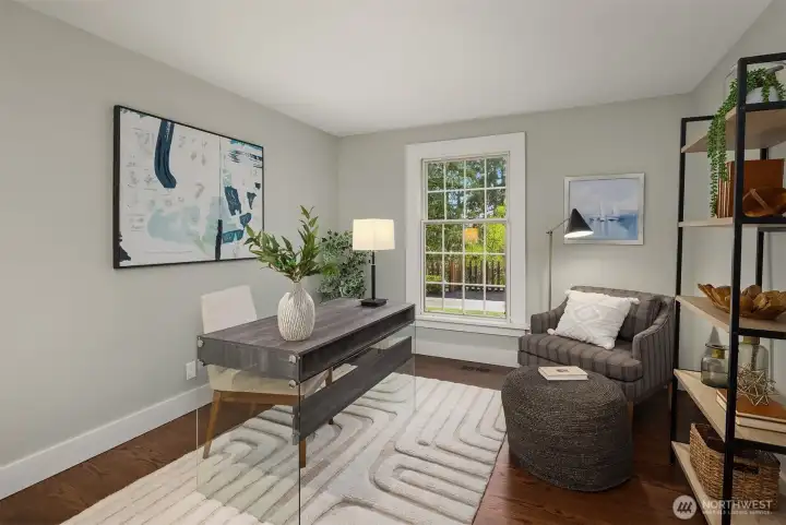 Whether you're working from home or escaping for some quiet time, this sun-filled office/den delivers — hardwood floors, garden views, and enough charm to make Mondays bearable
