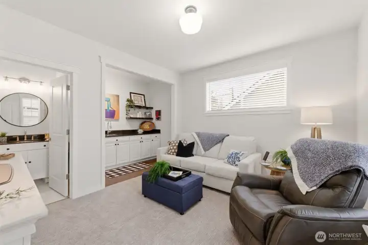 Bonus room on the main floor is located toward the back of the home. Perfect Mother in law space, office, or TV room.