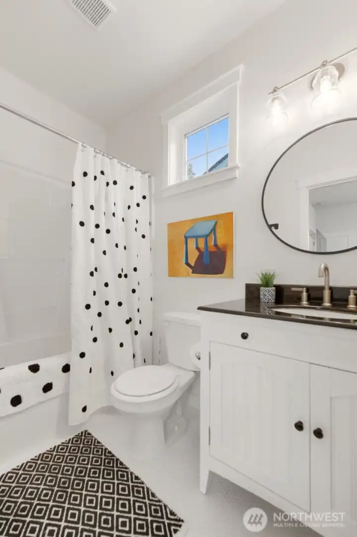 Full bathroom connected to main floor bonus room.